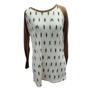 kira white shirt with brown sleeves